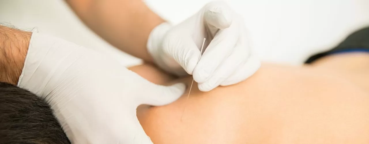 Pelvic floor patient receiving dry needling therapy treatment at Pelvic Health Physical Therapy in Madison, NJ.